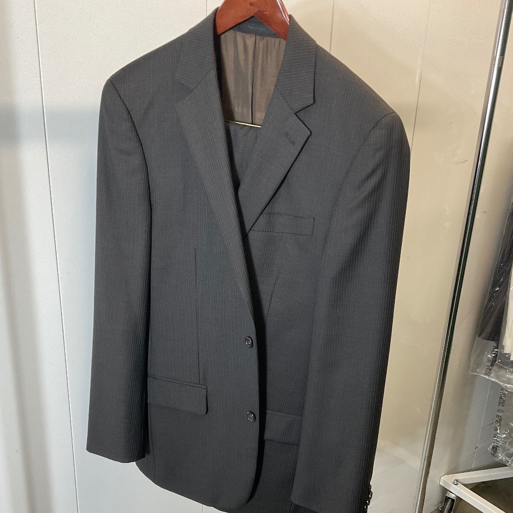 Brown pinstripe suit by  MICHEAL KORS size .40 long